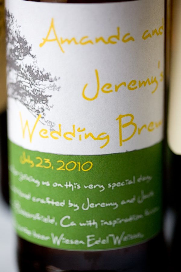 custom bottle labels with the couple's name and wedding date - yellow, green and white color palette - photo by Seattle based wedding photographers La Vie Photography